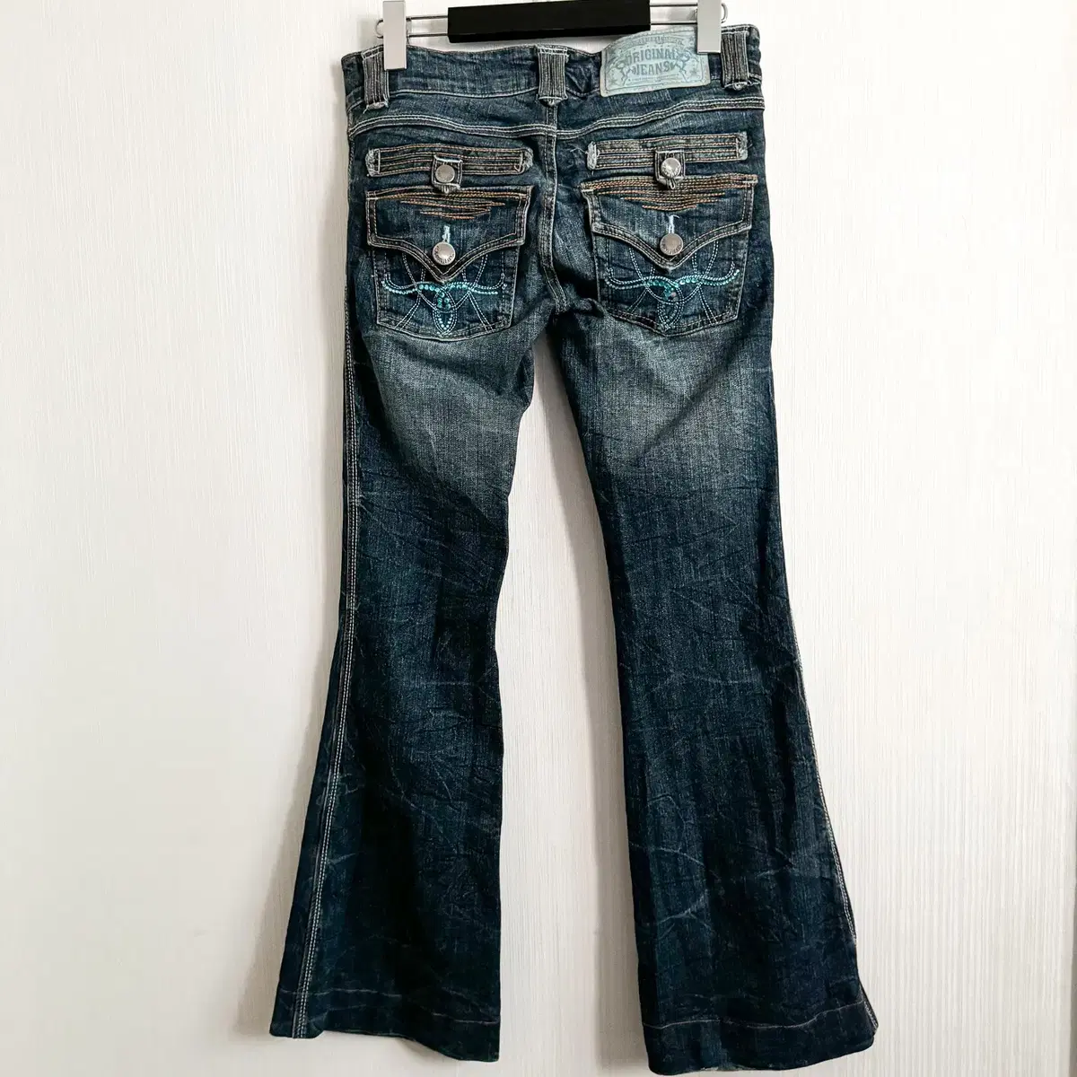 Back pocket point washing denim pants