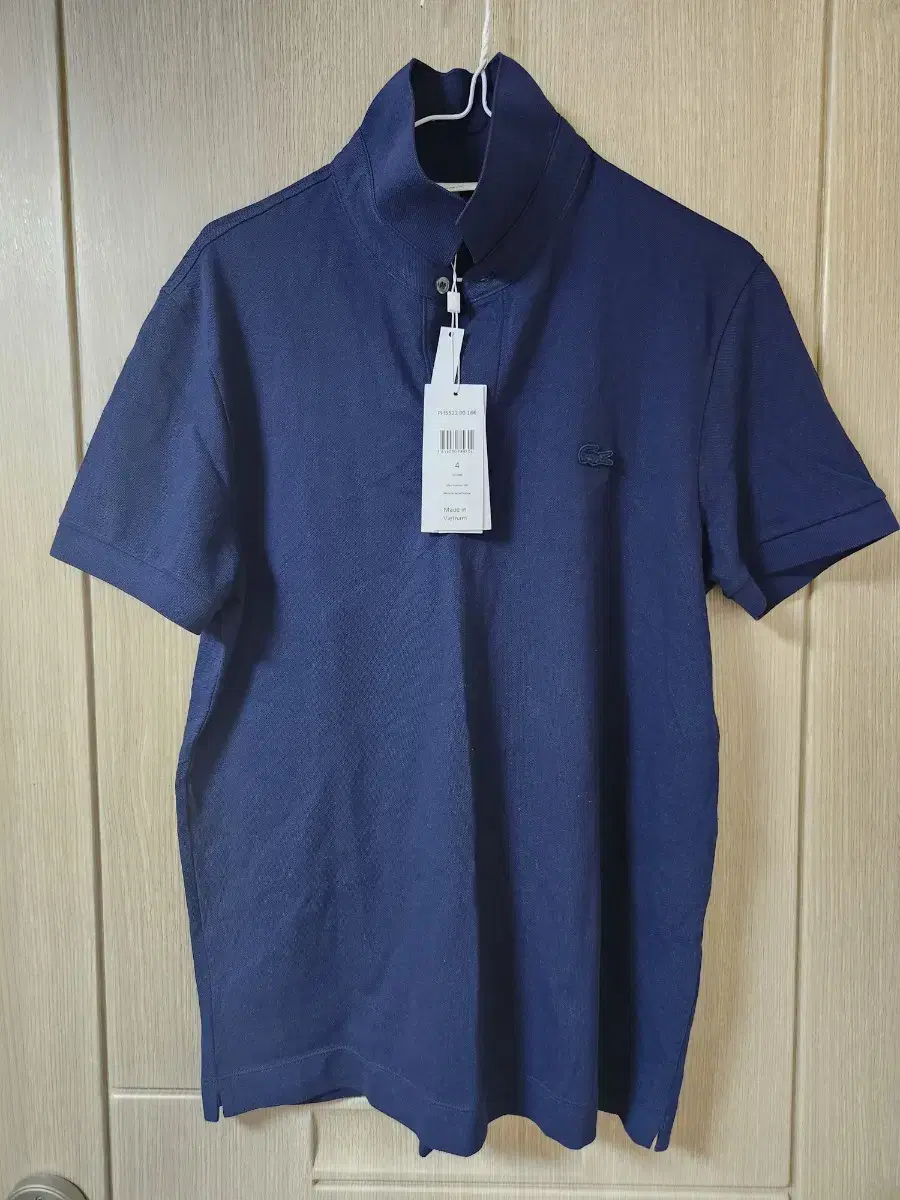 Lacoste Paris Polo Navy size 4