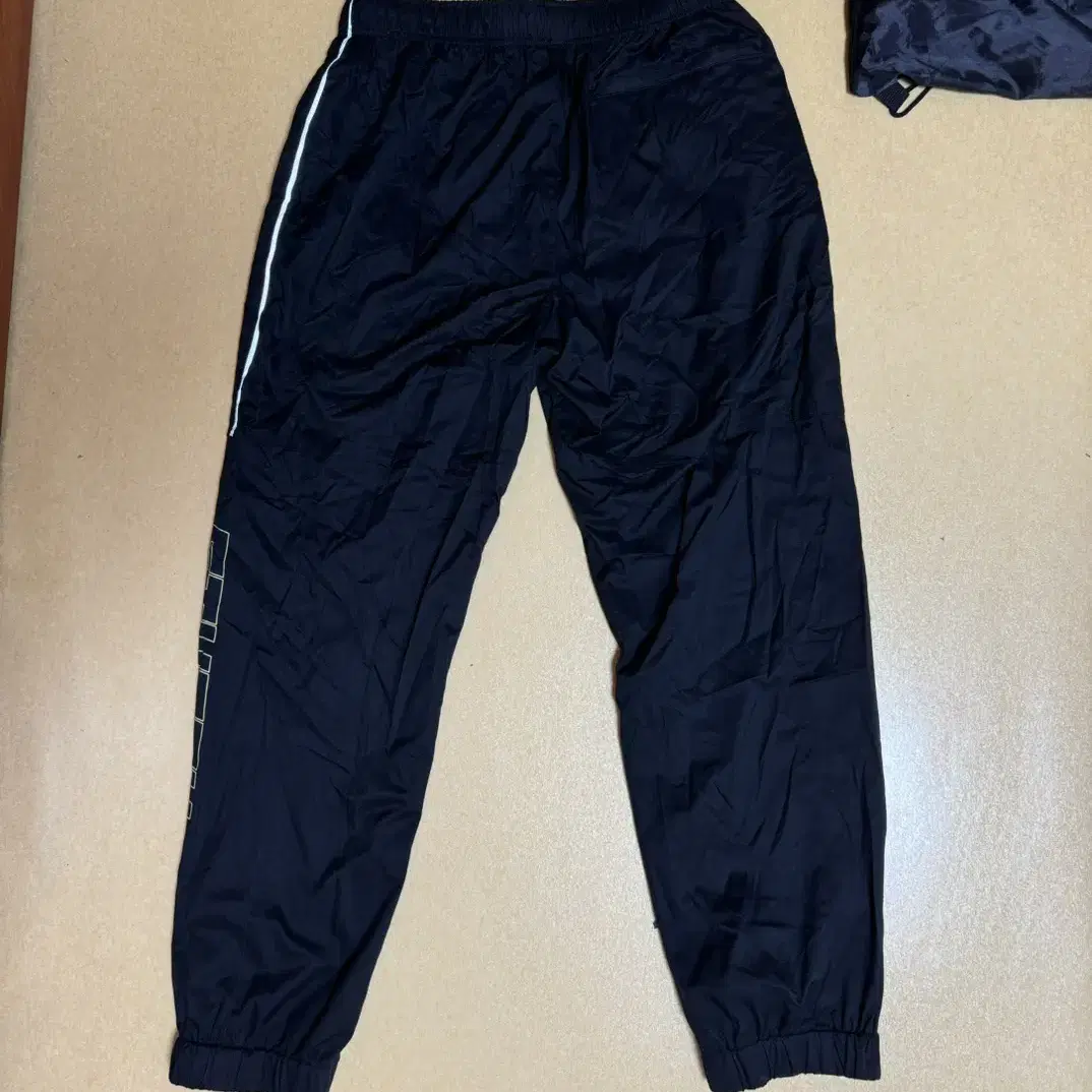 스투시 nylon track pants