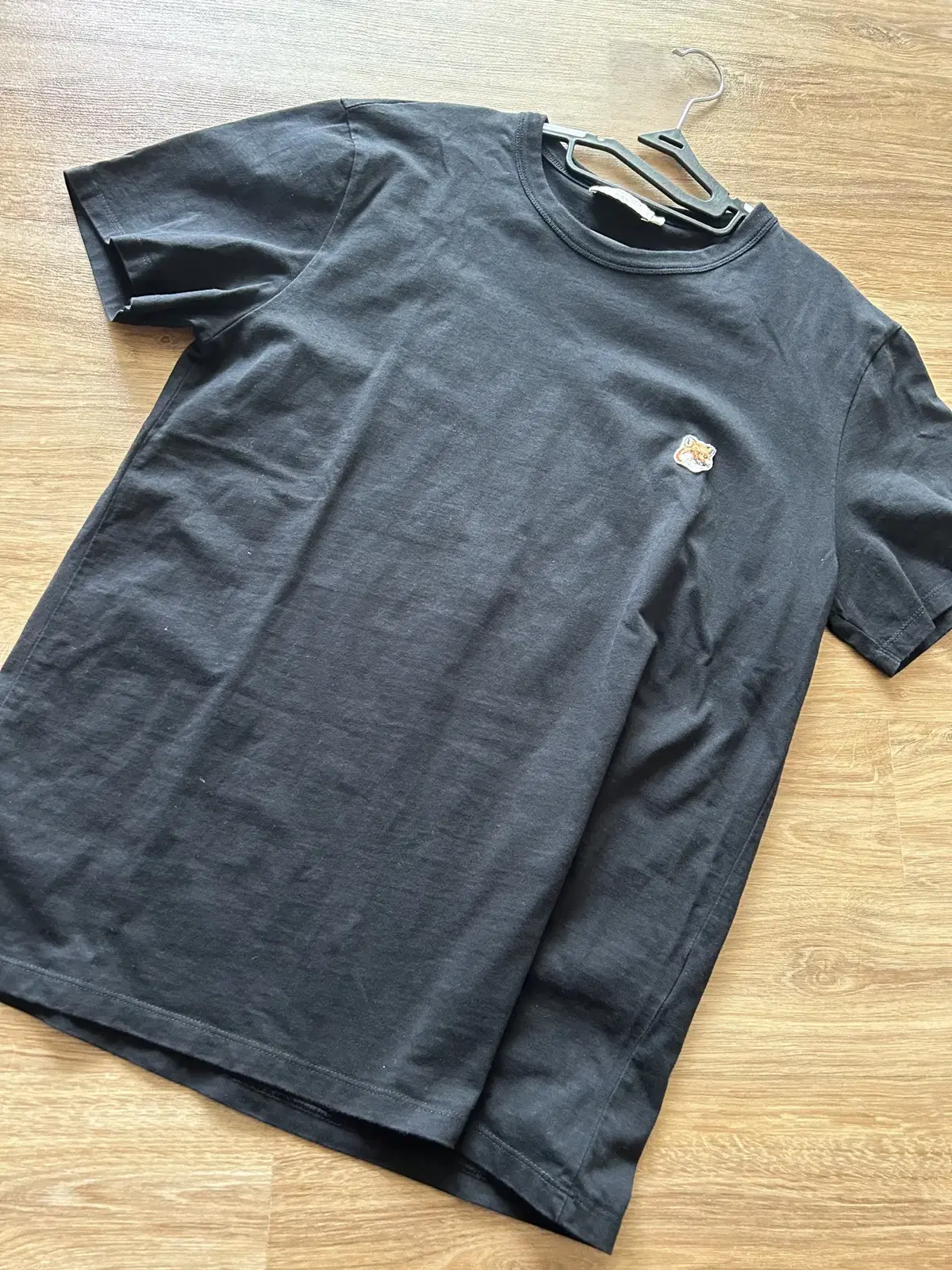 I'm selling my Maison Kitsune black vahn tee in size M.