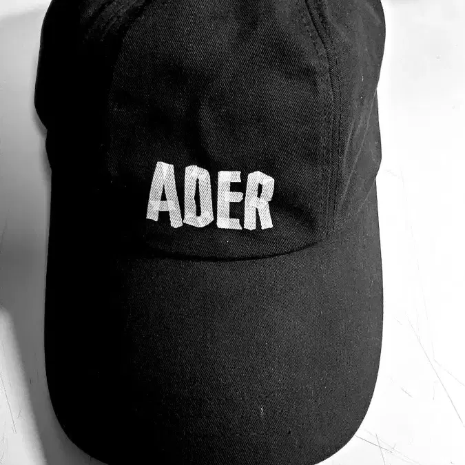 아더에러 테이프로고 볼캡 Adererror tape logo cap