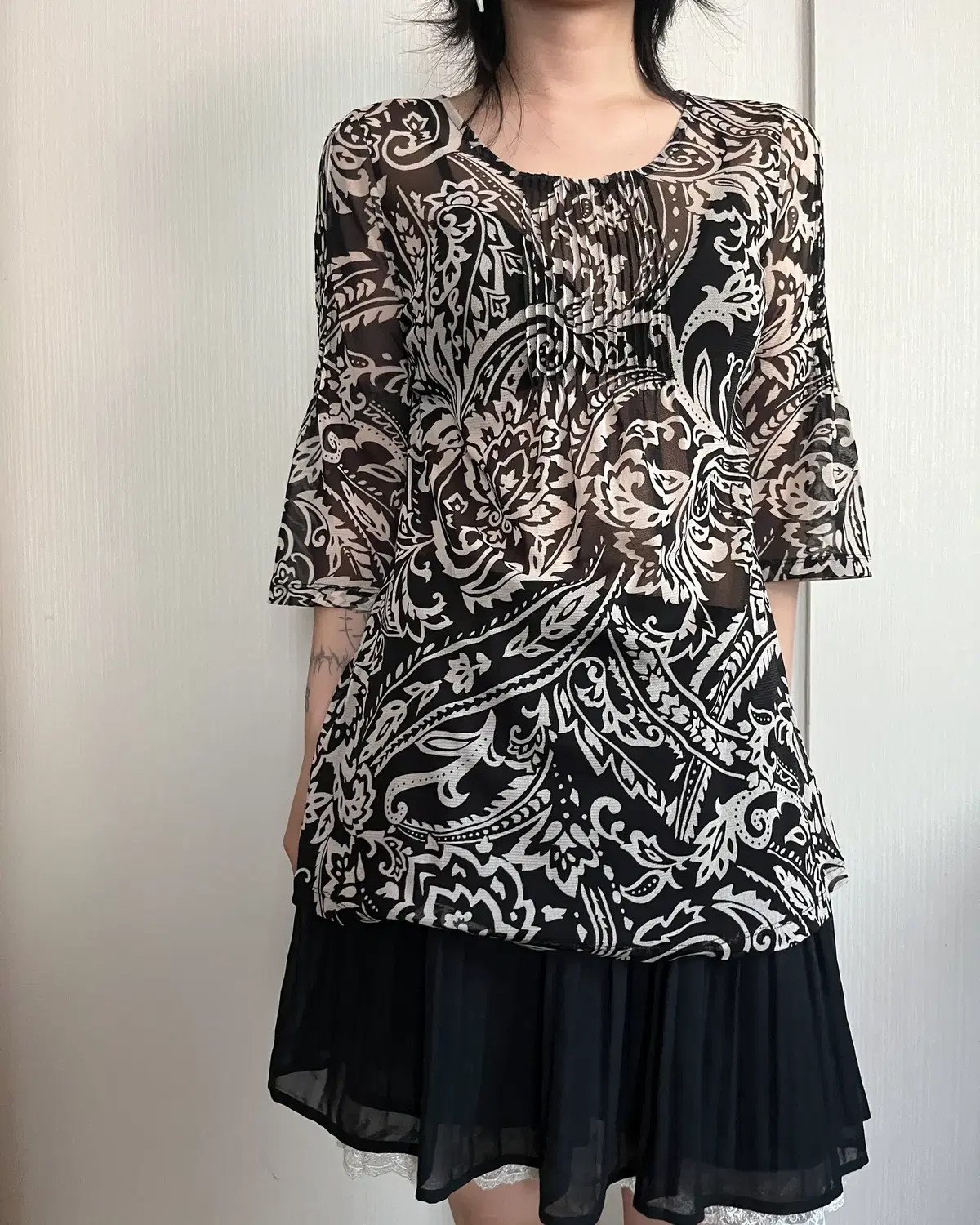 Oriental pattern mesh top