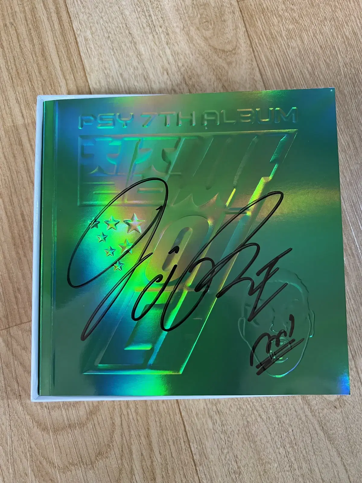 PSY autographed sign album