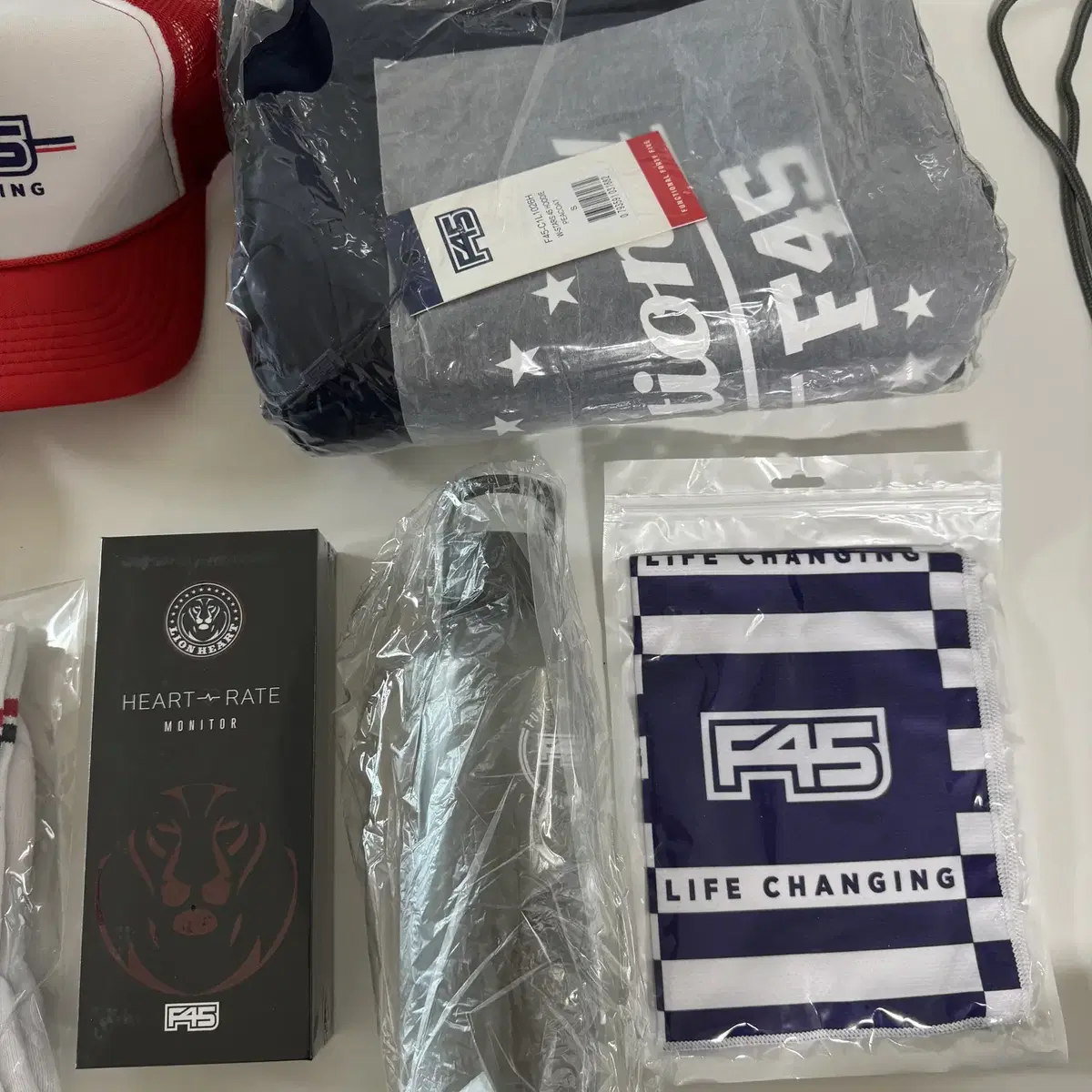 F45 프사오 기프트팩 가방 라이언하트 후드티 모자 타올 텀블러