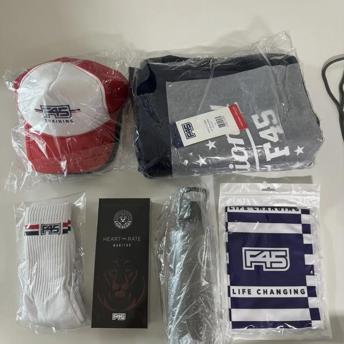 F45 프사오 기프트팩 가방 라이언하트 후드티 모자 타올 텀블러