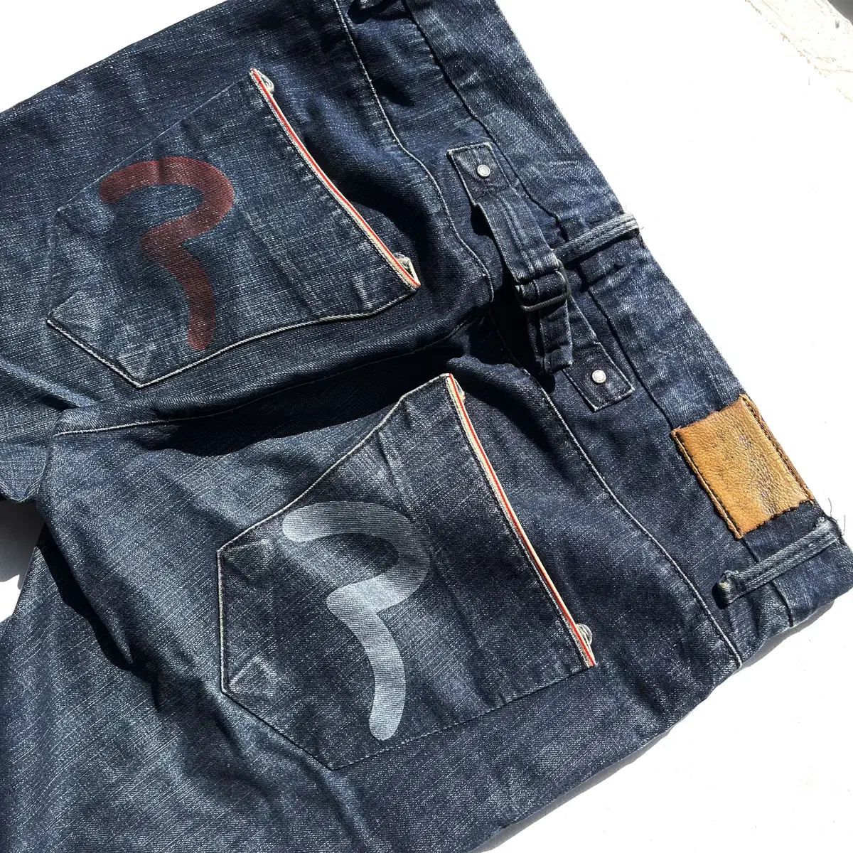 [38] Evisu Big Logo Cinchback Pocket Detail Denim Pants