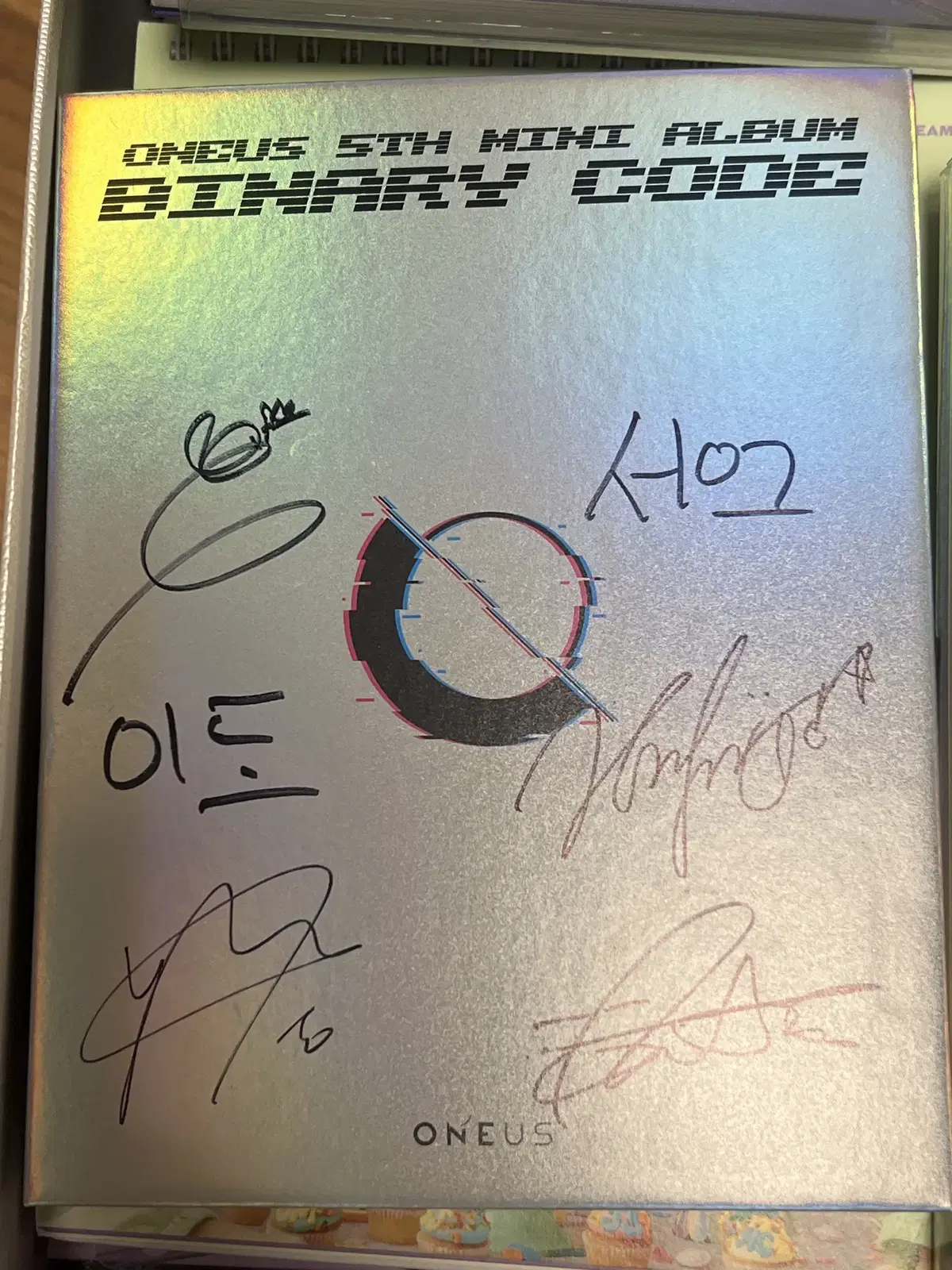 Oneus autographed signature