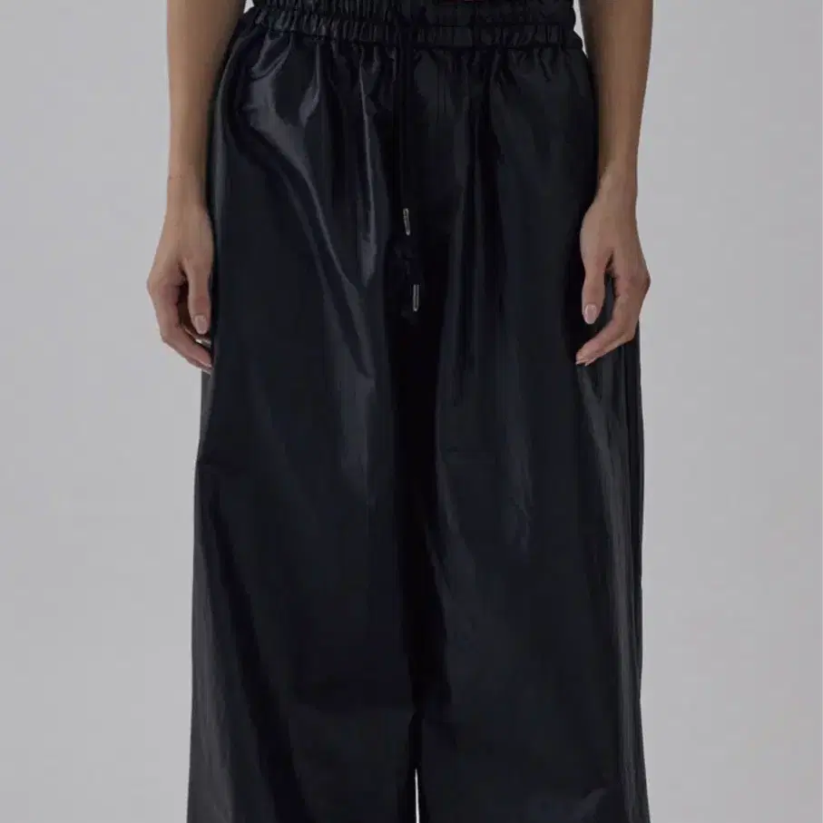 트리밍버드 Glow Nylon Jogger Pants