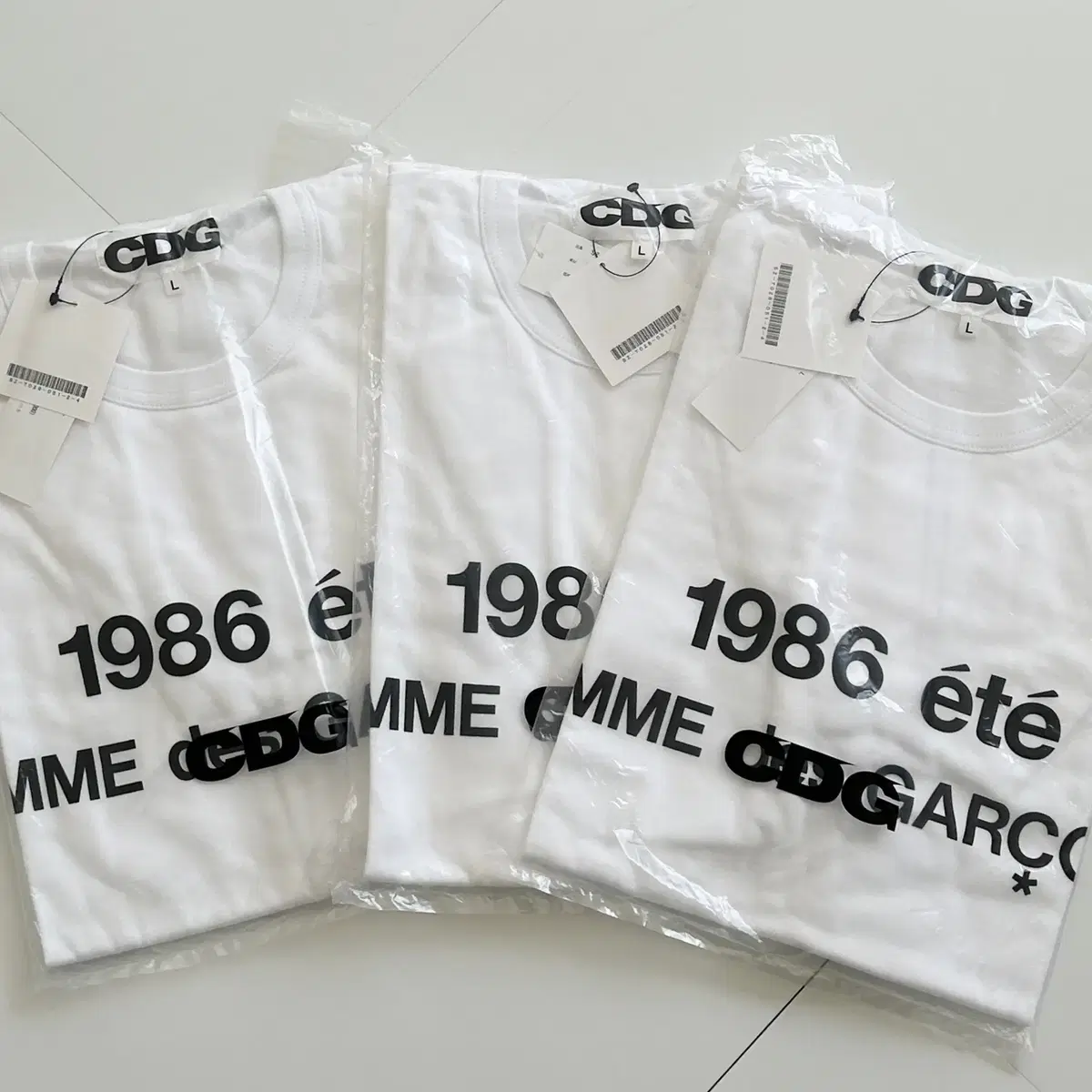 CDG 1986 화이트 반팔 티셔츠(L,XL사이즈 새상품)