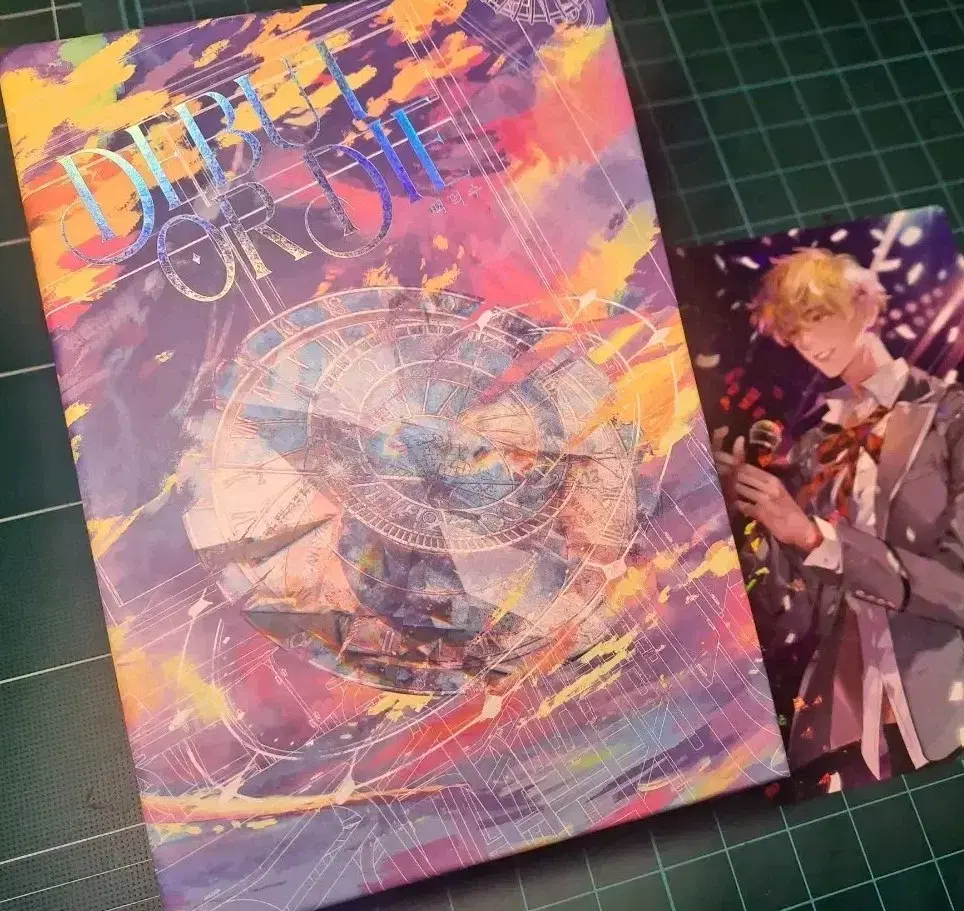 Debut or Die Hardcover Volumes 1 & 2 with mini-poster