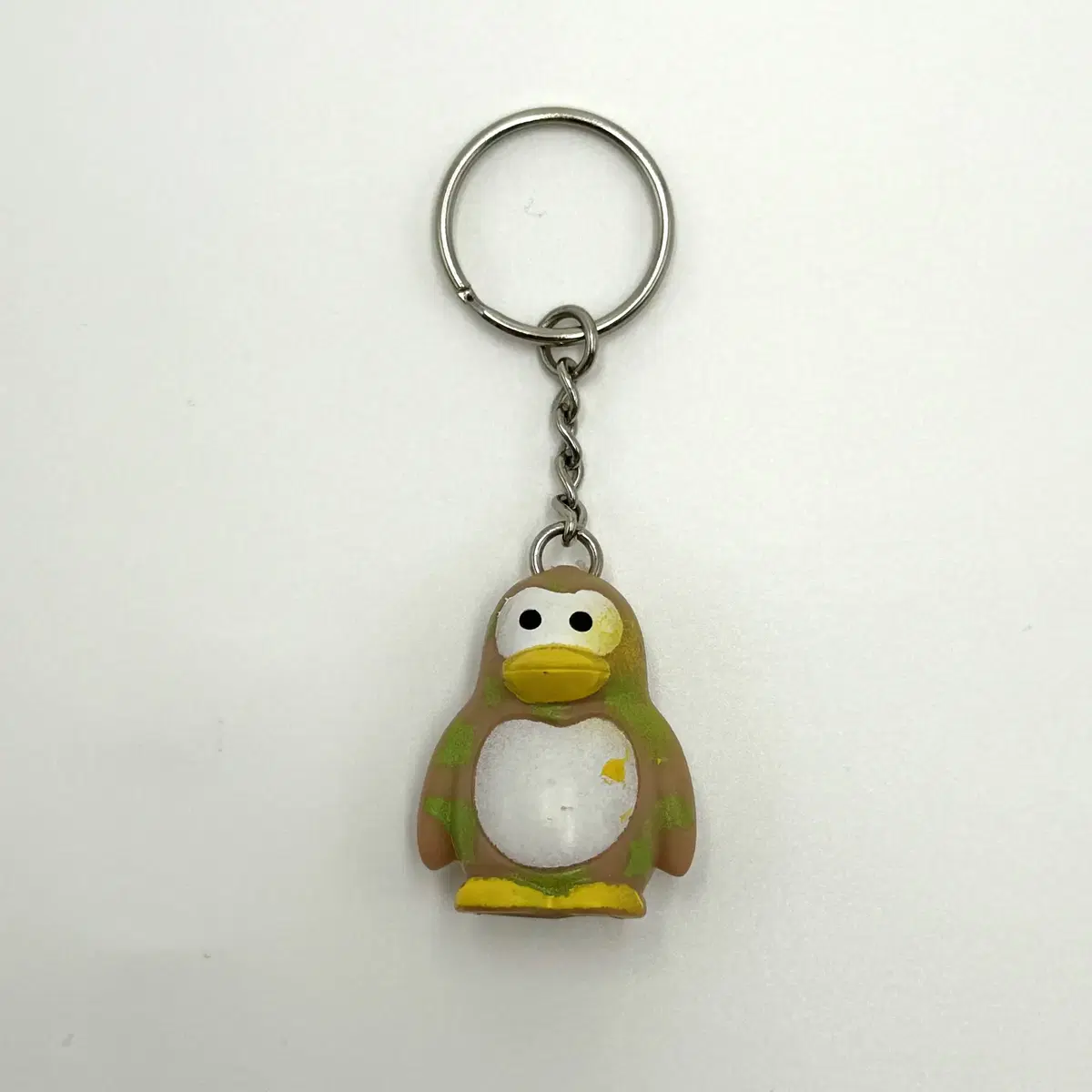 Vintage keychain Penguin Stains of green