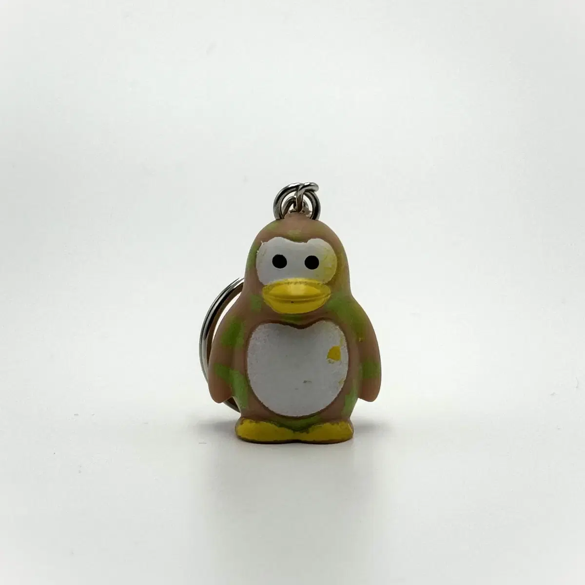 Vintage keychain Penguin Stains of green