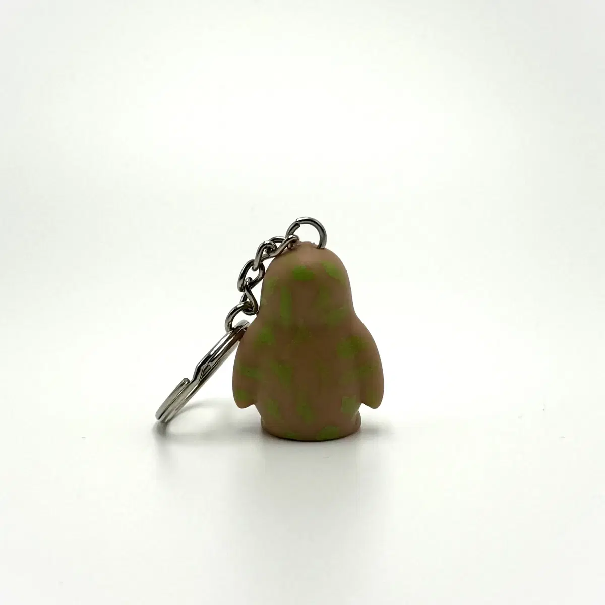 Vintage keychain Penguin Stains of green