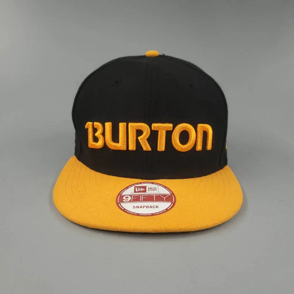 뉴에라 X BURTON 버튼 블랙 옐로우 투톤 로고 9FIFTY 스냅백