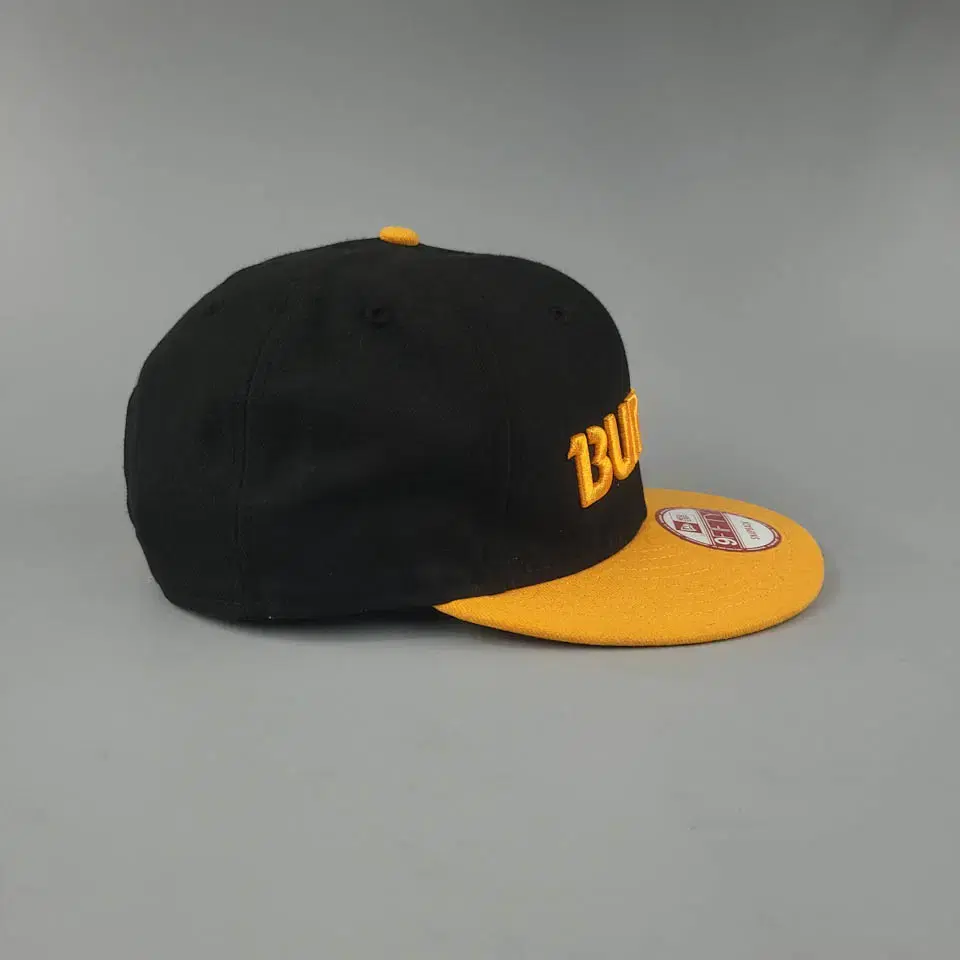 뉴에라 X BURTON 버튼 블랙 옐로우 투톤 로고 9FIFTY 스냅백