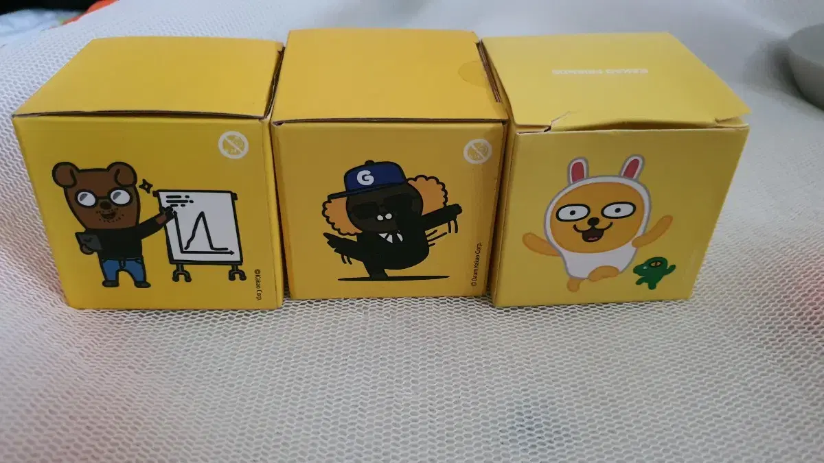 Three Kakao Friends figures