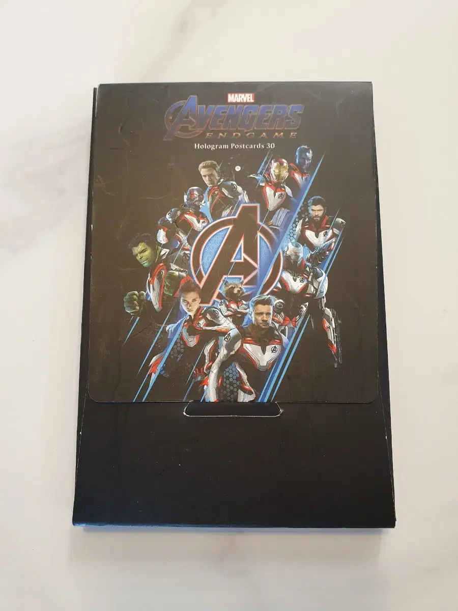 The Avengers hologram Sell 30 postcard books.