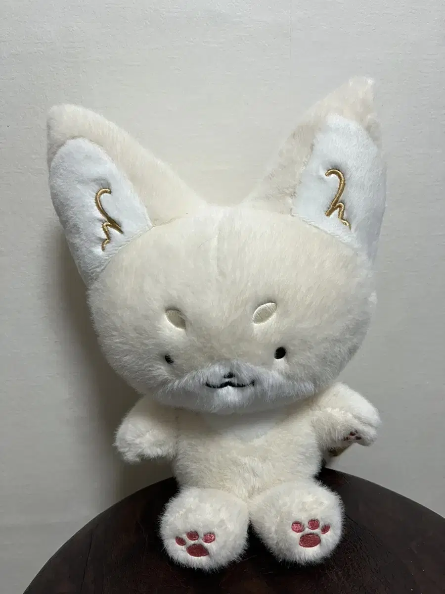 It's a medium-sized kitsune doll.