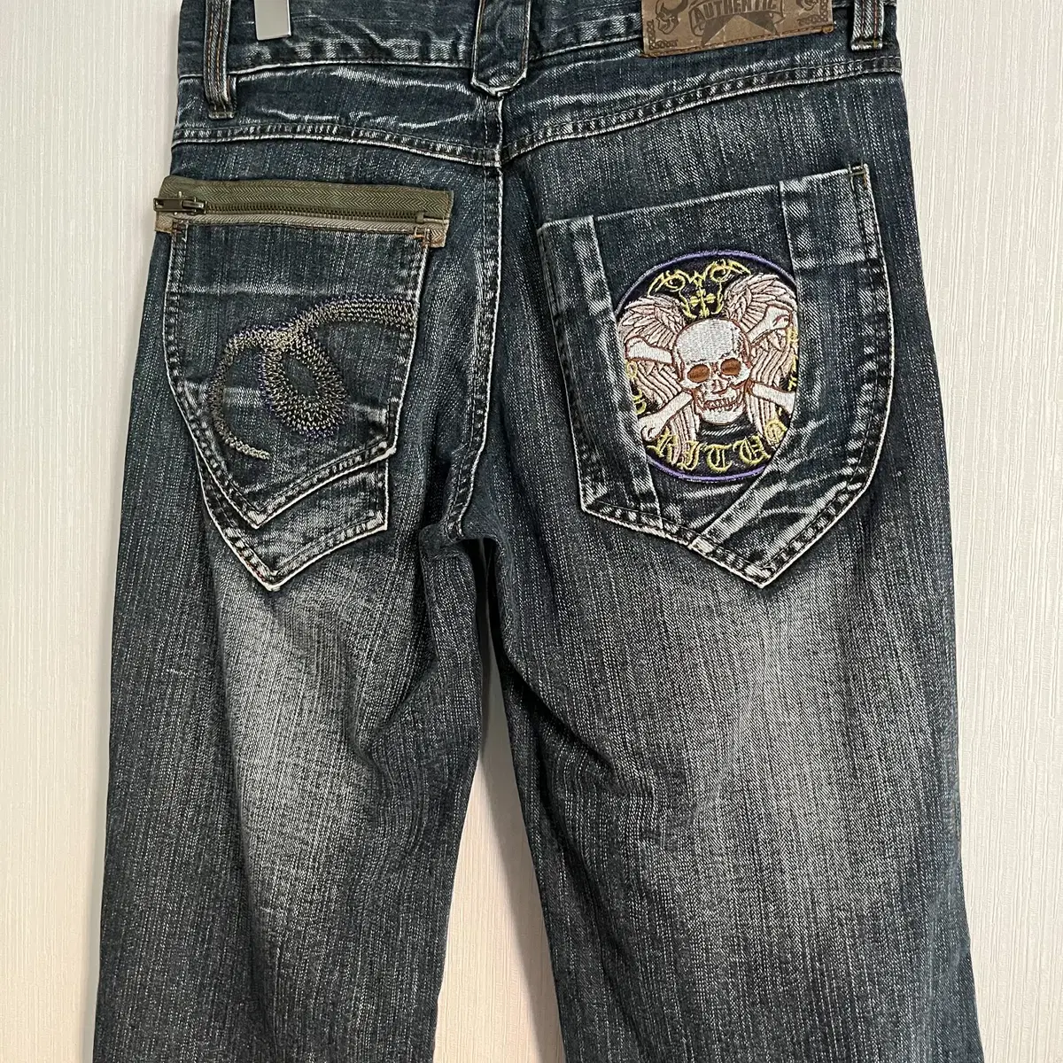 Back skull point denim pant