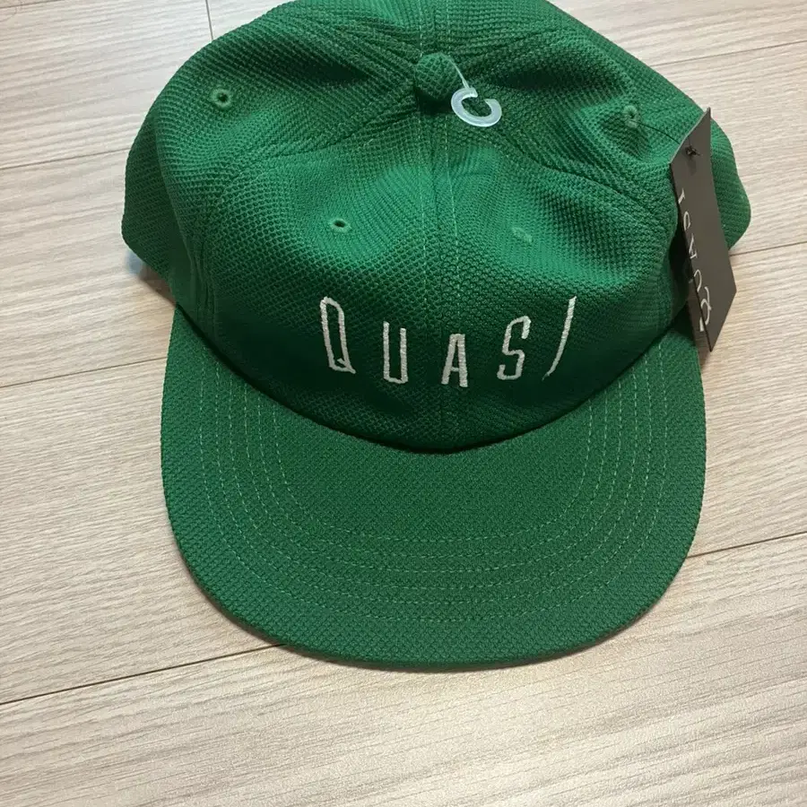 콰지(quasi)스케이트보드 스냅백 모자 켈리그린