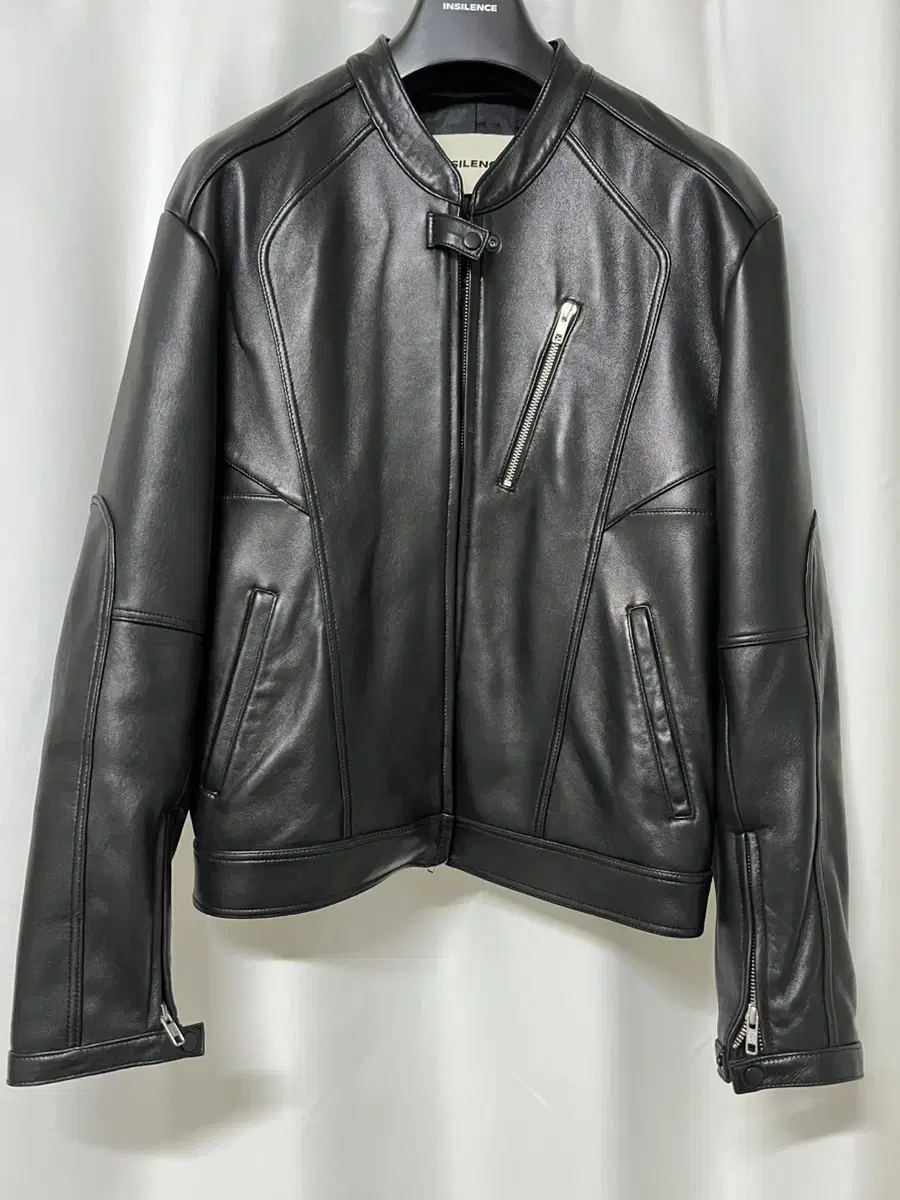 I am selling an Insilence lambskin biker jacket, size medium.