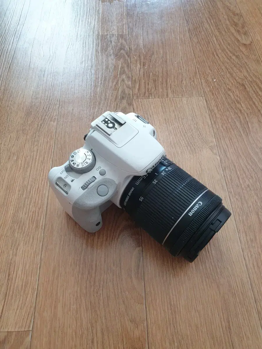 Canon EOS 100D DSLR camera for sale.