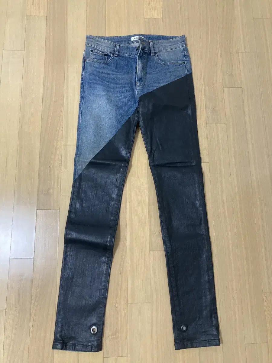 Omerta Coated Denim Pants for sale