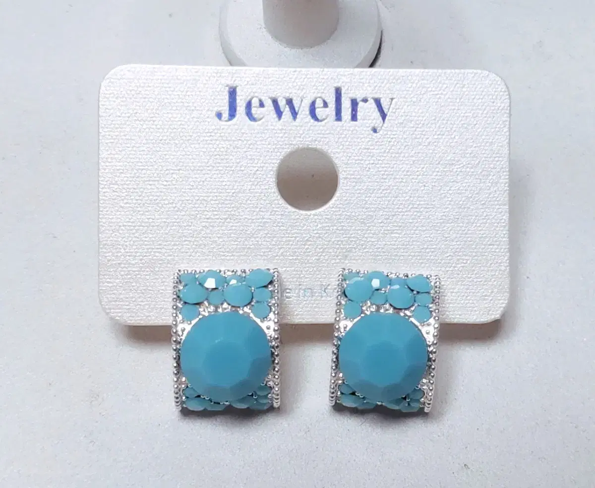 Simple light blue cubic earrings