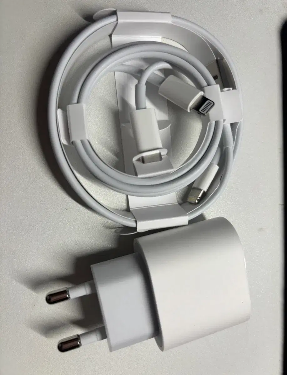 Original iPhone charging cable/adapter (negotiable)