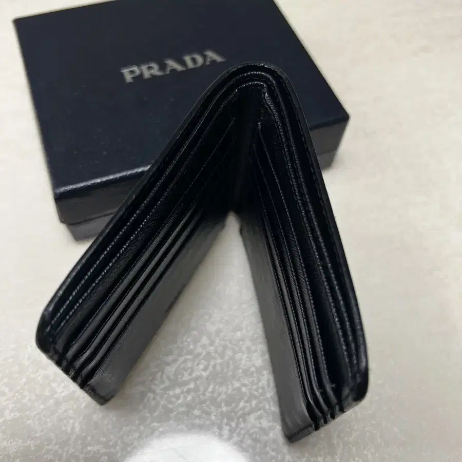 Prada 사피아노 반지갑 2M0513 PN9 F0002 001