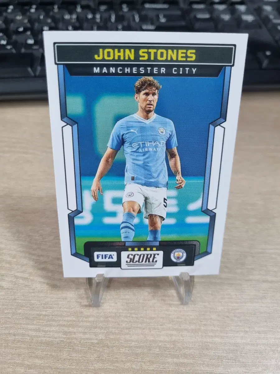 23-24 Panini score Manchester City zone Stones soccer kard!