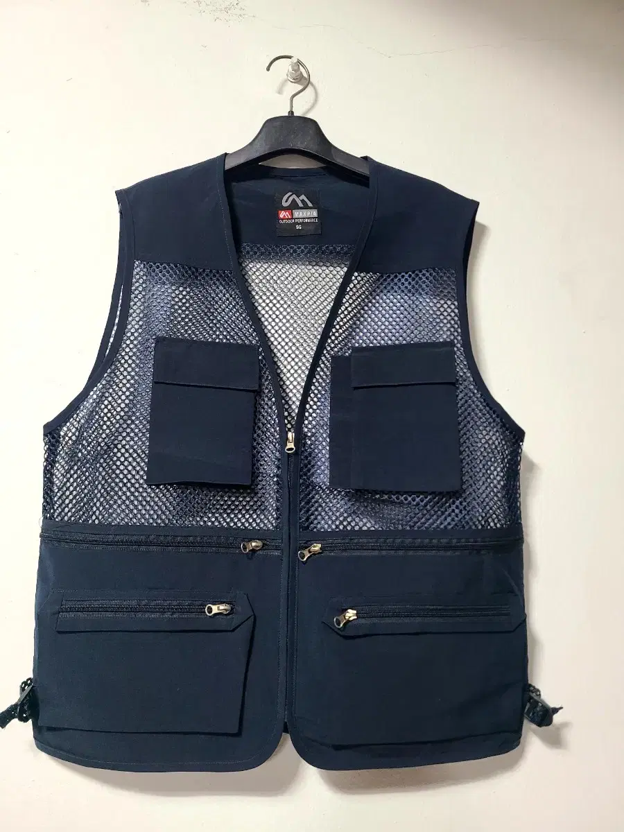 Fishnet vest with many pockets