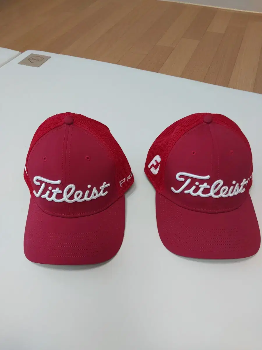 2 Titleist golf hats (couple)