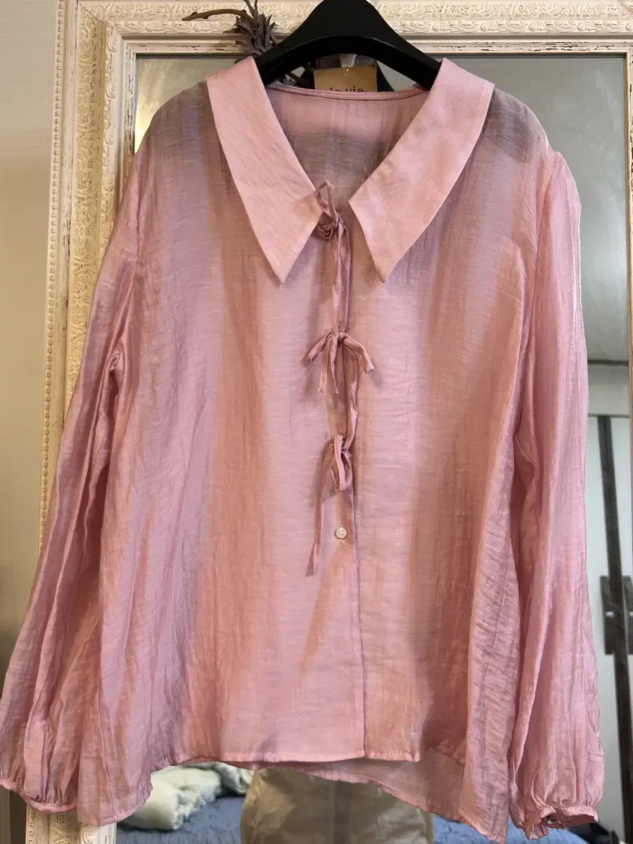 Pink see-through blouse