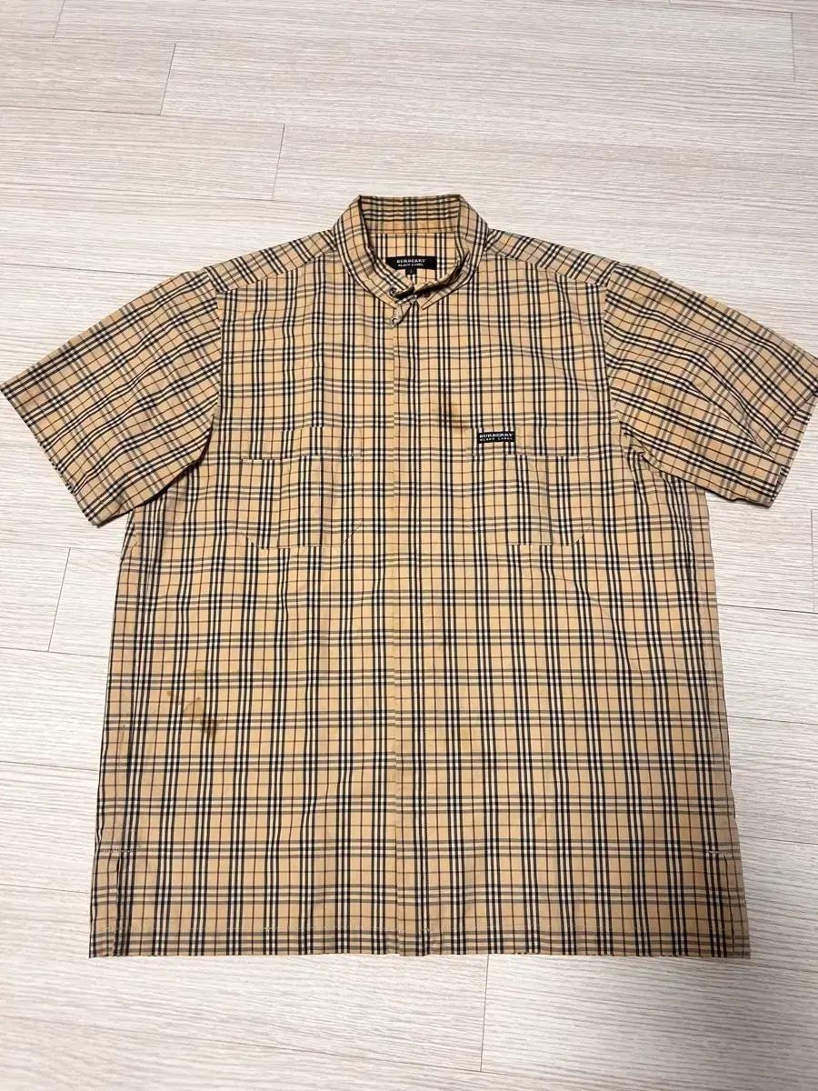 Burberry Black Label Came vahn short sleeve zip-up (2) sells.