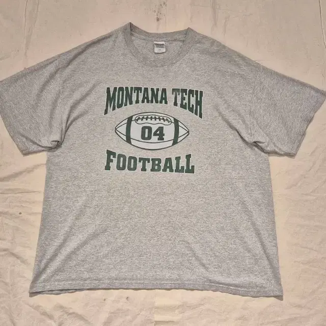 XL~>MONTANA TECH FOOT BALL