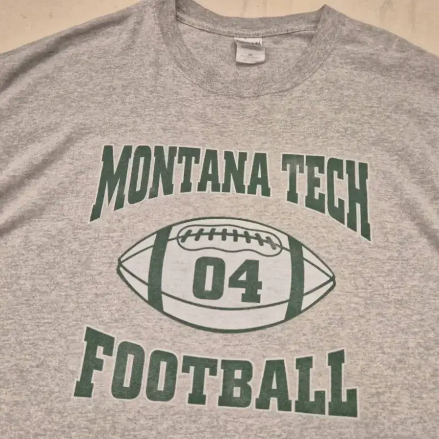 XL~>MONTANA TECH FOOT BALL