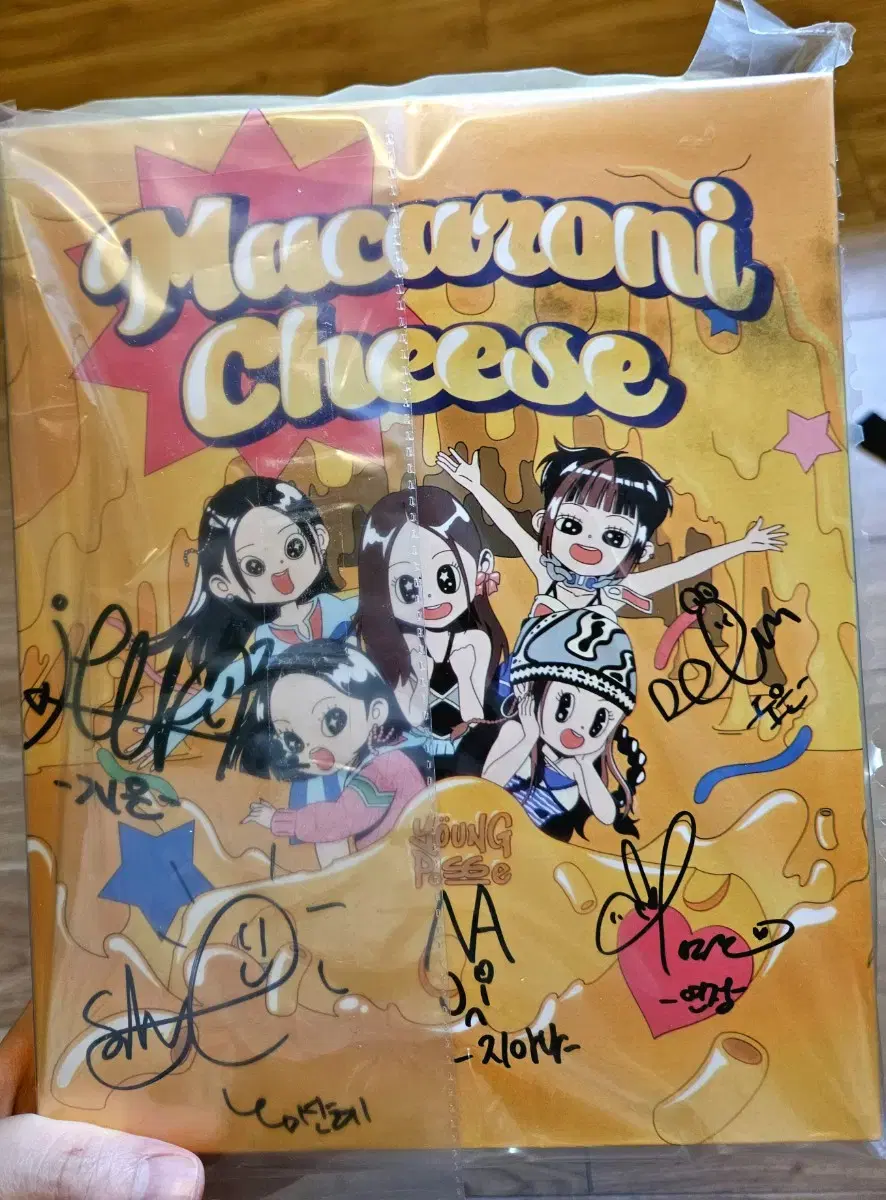 Mr. Youngpa sign album Sells macaroni and cheese