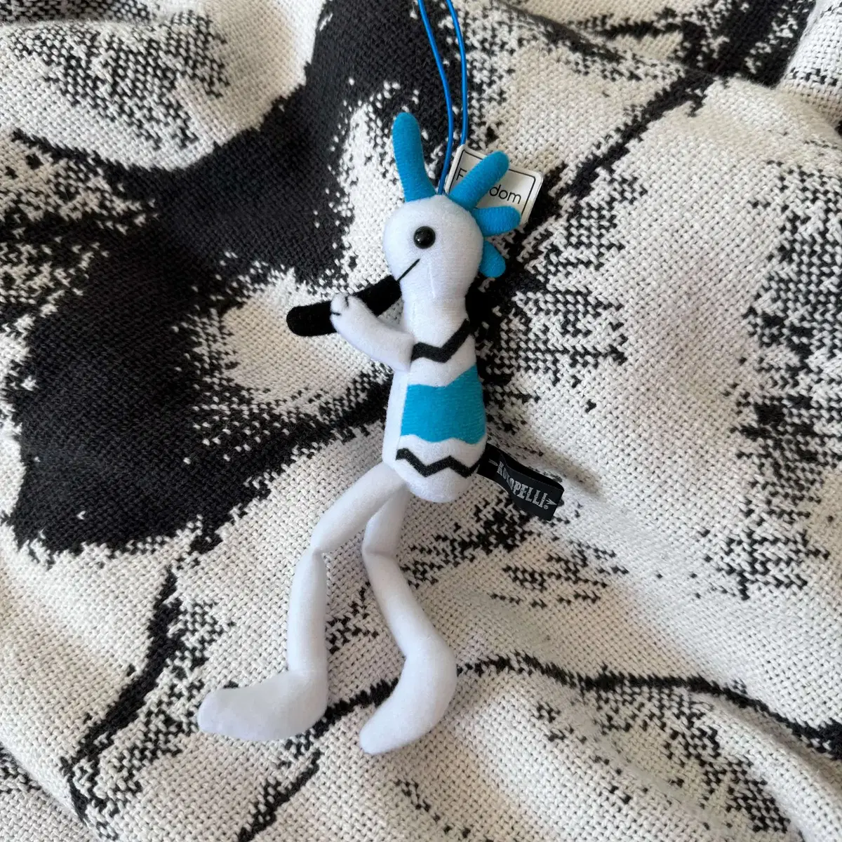 K,C R4T big kokopelli keyring