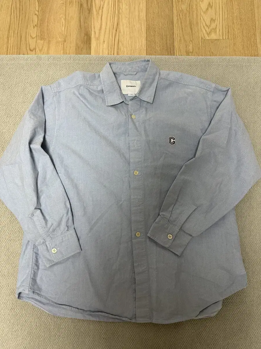 L) CoverNet Oxford South, selling shirts.