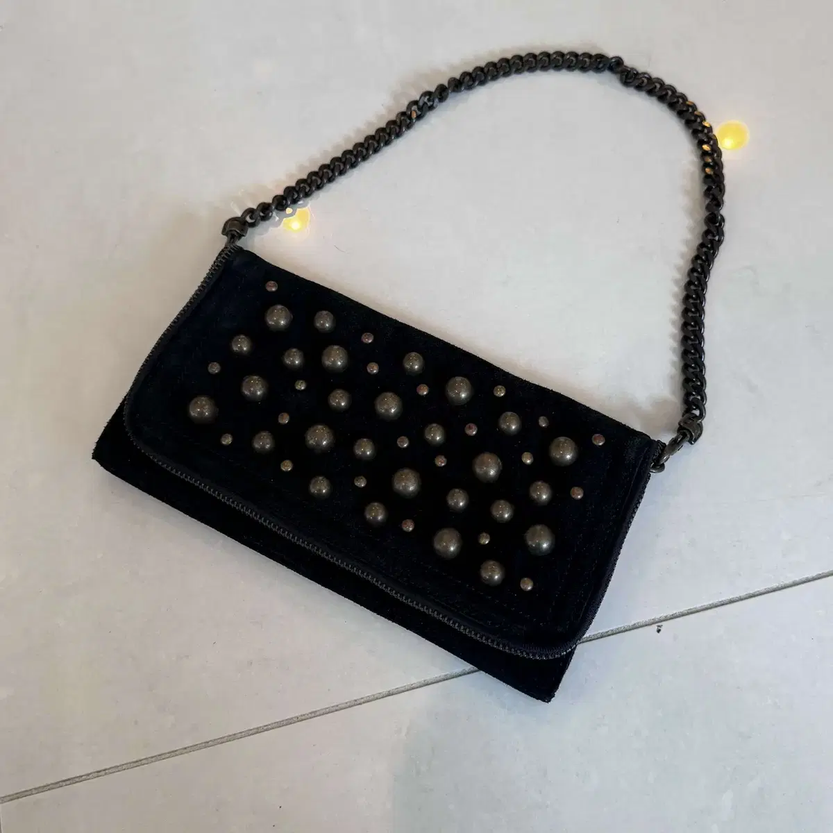 moussy stud clutch bag