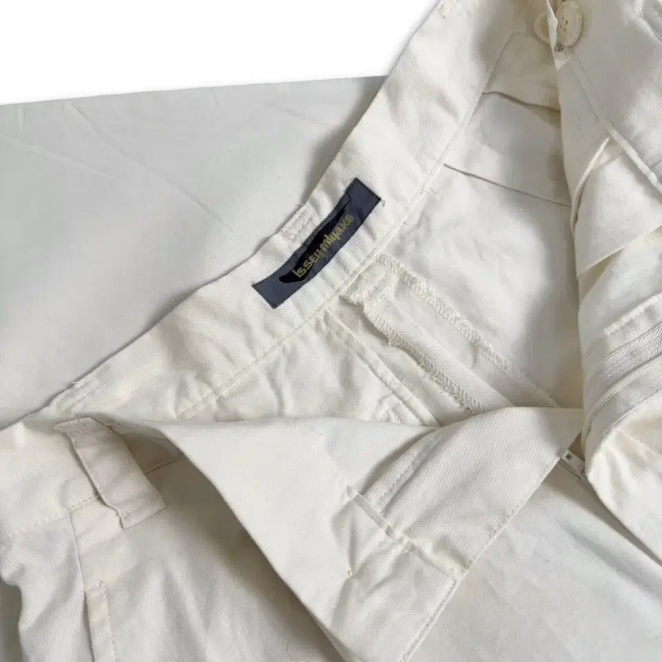 80s Issey Miyake ivory pleated pants