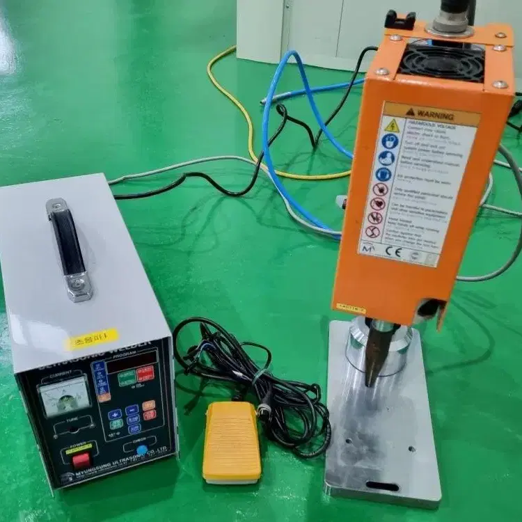 명성 초음파용착기 Ultrasonic welder.