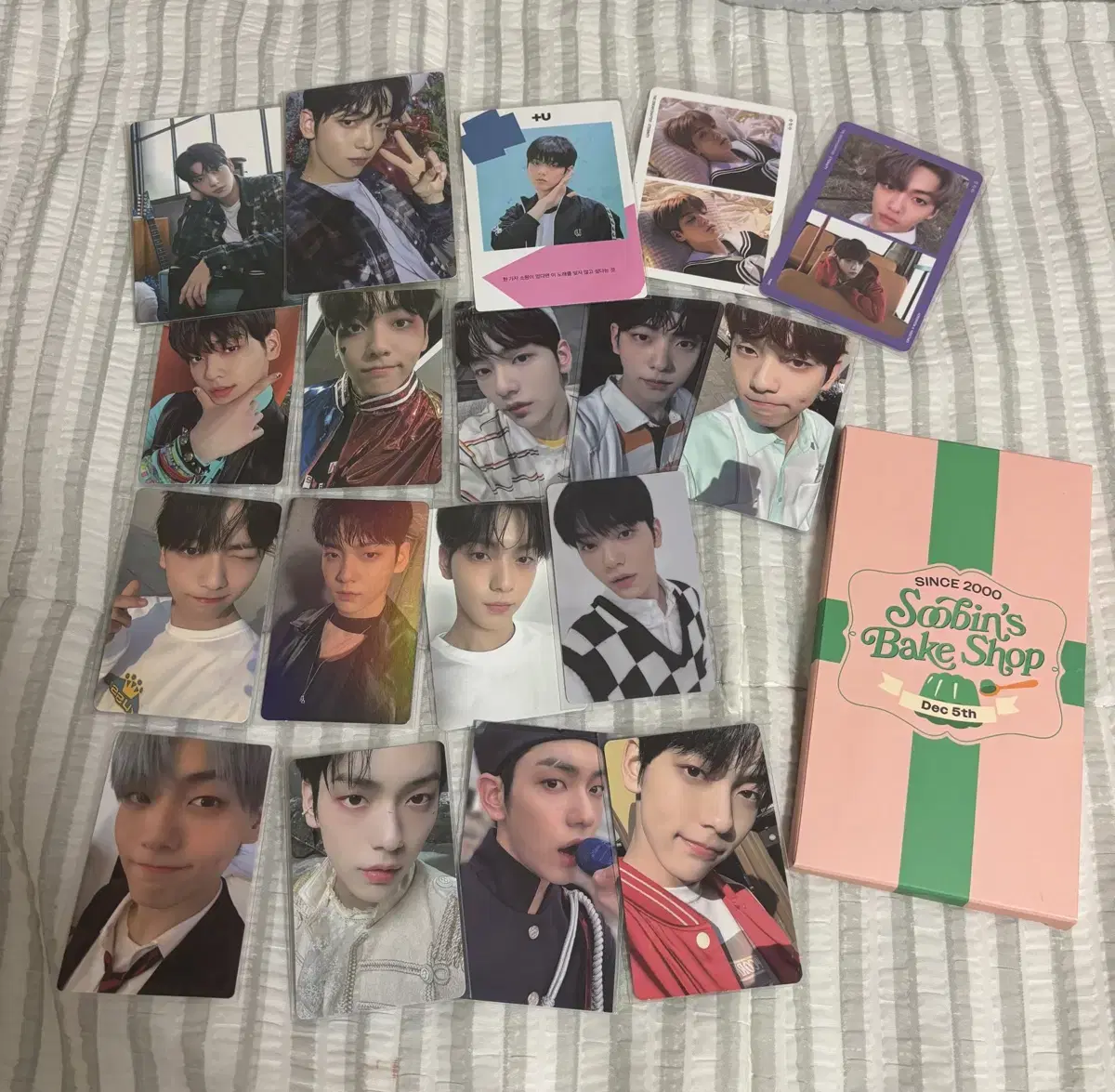 TXT soobin photocard sells them really cheap in bulk.