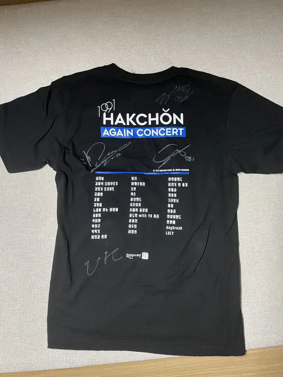 Lucy's signed t-shirt.