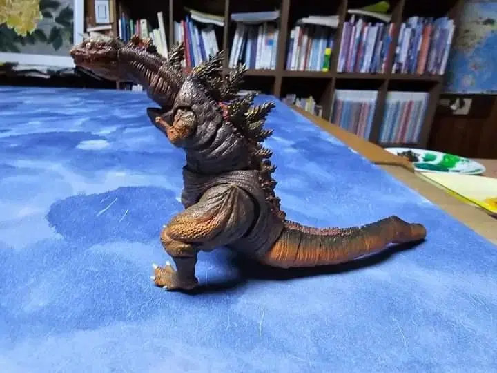 Sell an S-scale Godzilla figure.