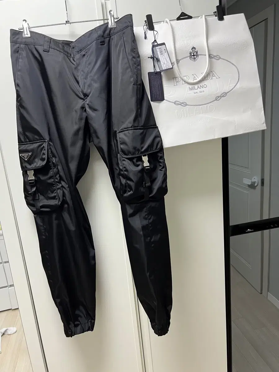 Prada Rina Nylon buckled trousers 48