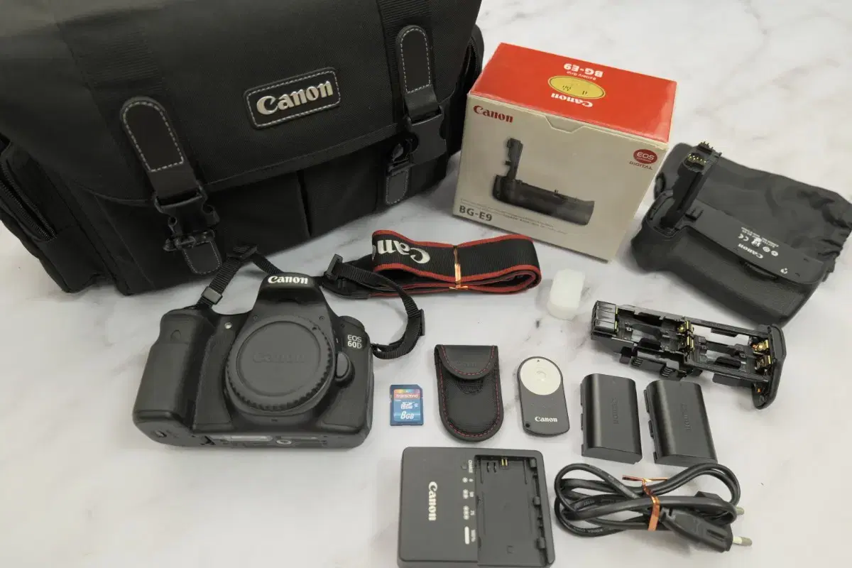 Canon mid-range DSLR camera EOS 60D with original portrait grip