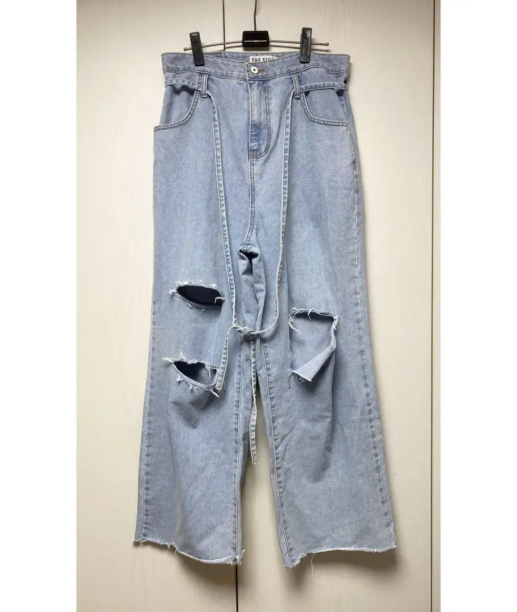 The first Damage Point Soft Jeans Belted Wide Denim Pants Madongseok Pants