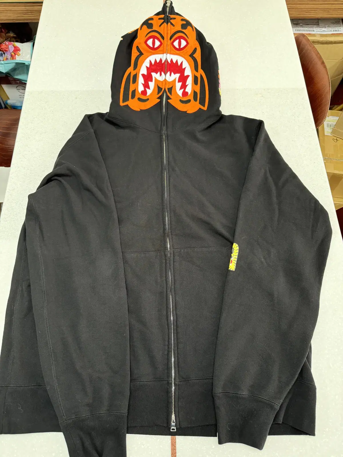 I am selling a Vape Tiger full zip up in size 3XL in gray.